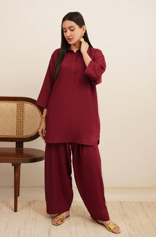 Raya Solid Red Co-ord set is made from ultra-soft wash and wear material featuring short shirt with collar and placket details and shalwar with relaxed fit