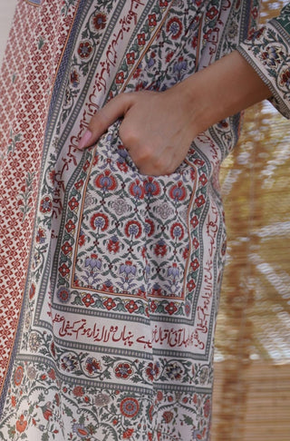 Shopmanto, wear manto pakistani clothing brand, manto ready to wear women one piece brick red gul-e-jahaan long printed urdu lawn kurta featuring poetry of allama iqbal calligraphed through out the kurta
