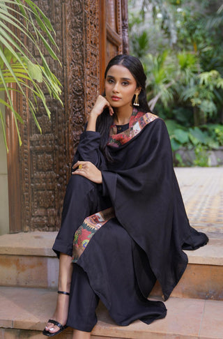 Shop manto, wear manto pakistani clothing brand ready to wear black & rust unisex bagh-e-mughal cape urdu scarf with urdu calligraphy featuring poetry inspired by mughal gardens