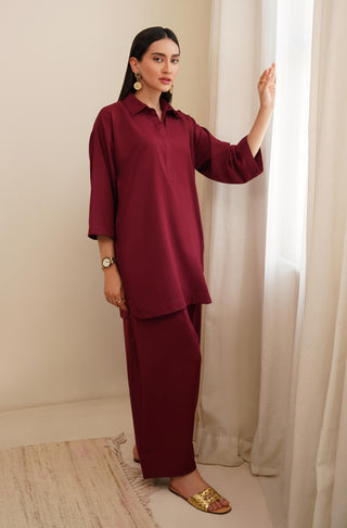 Raya Solid Red Co-ord set is made from ultra-soft wash and wear material featuring short shirt with collar and placket details and shalwar with relaxed fit