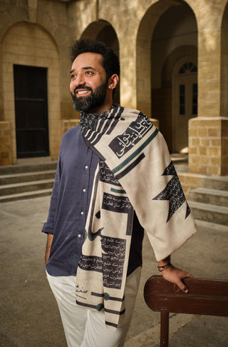 Muzaffar Bukhari wearing Manto's Unisex Teacher's Day Azm Stole with Urdu Calligraphy