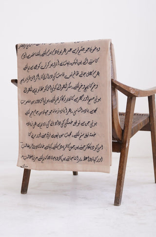 Shopmanto, wear manto pakistani clothing brand ready to wear men and women textured double sided beige armaan stole muffler with urdu calligraphy featuring poetry of mirza ghalib, urdu winter stoles