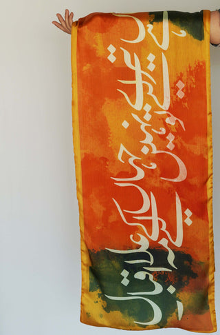 Shopmanto, wear manto pakistani clothing brand, urdu calligraphy clothes, manto women ready to wear jahaan orange and green urdu silk scarf stole calligraphed with poetry of Allama Iqbal