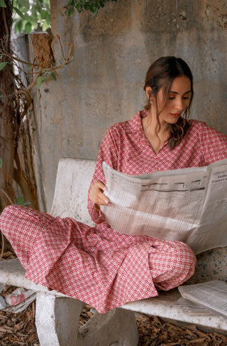 Shopmanto, wear manto pakistani clothing brand women ready to wear manto red and white blocks two piece matching co-ord set with shirt collar and straight trouser pants, random urdu letters calligraphed throughout the set