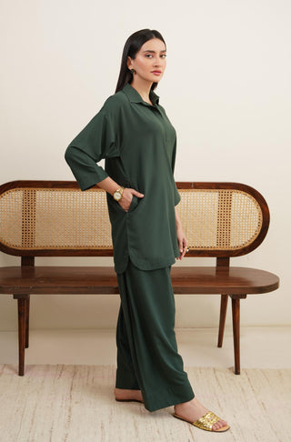 Raya Solid Green Co-ord set is made from ultra-soft wash and wear material featuring short shirt with collar and placket details and shalwar with relaxed fit