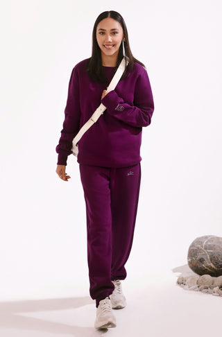 Manto, Pakistan's Most Comfy Women's Ready to Wear Triple Layered Premium Fleece Very Plum Talaash Sweatshirt with Urdu Calligraphy of Poetry by Nida Fazli Paired with Matching Jogger Pants